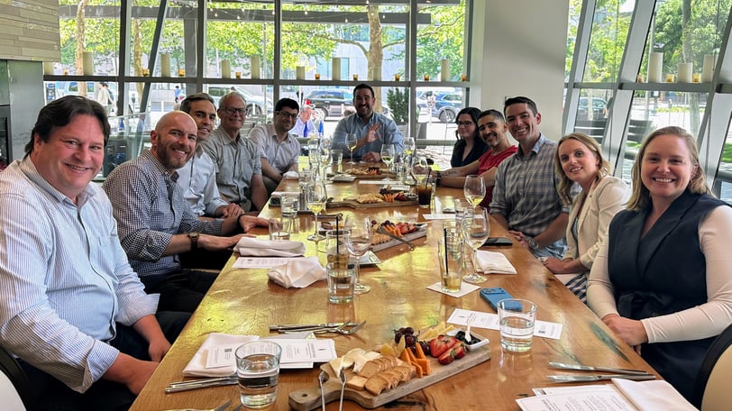 16-9 group pic of table, 60426 Growth, Apollo GTM Roundtable Boston