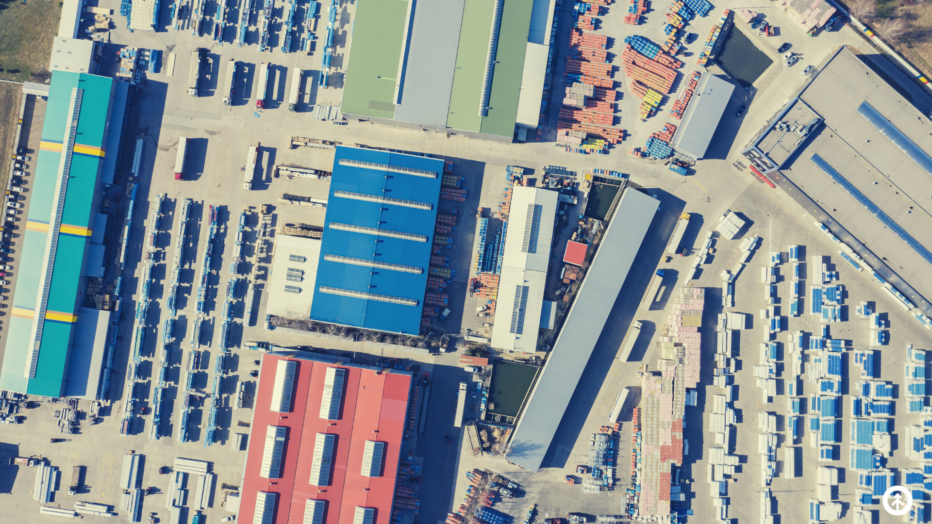 An aerial view of a large manufacturing plant. 